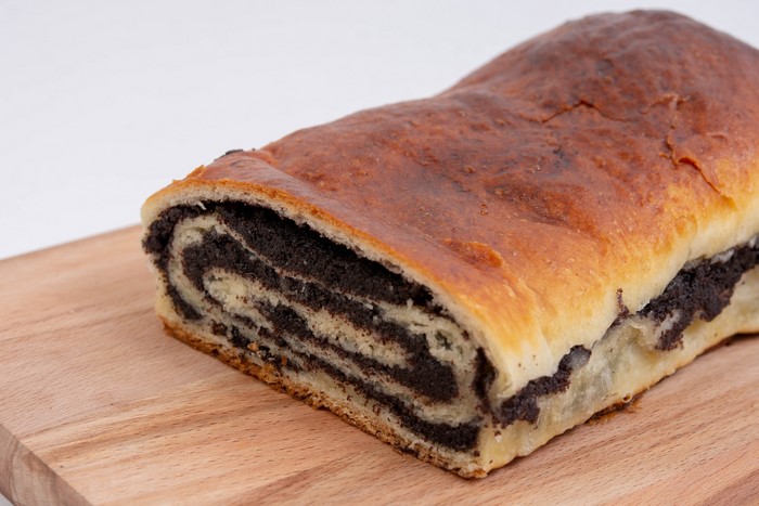 Poppy seed roll on a wooden board
