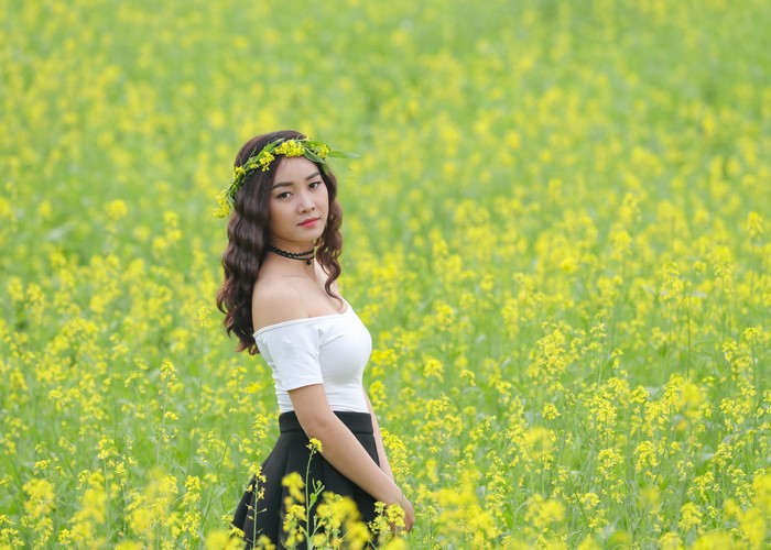 4K Asian Woman in Rapeseed Field