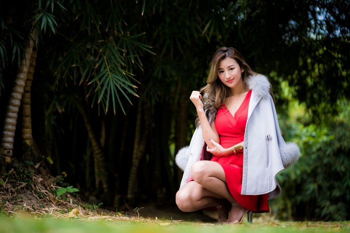 4K Asian Woman Sitting in Red Dress and Coat
