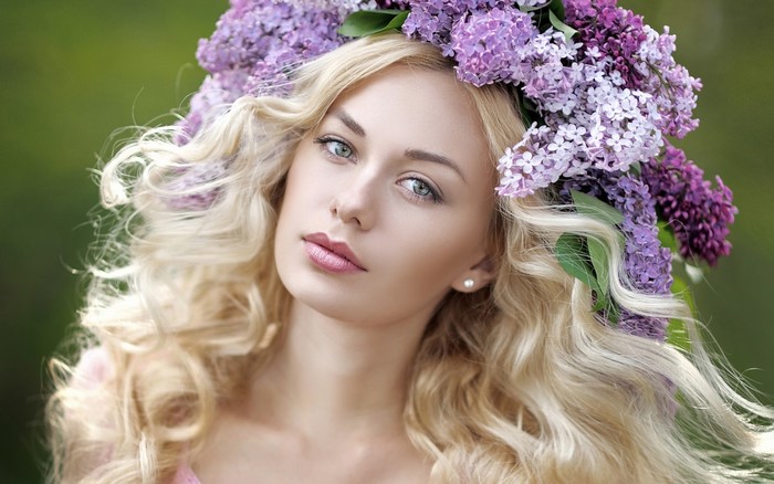 Blonde woman with lilac flower crown