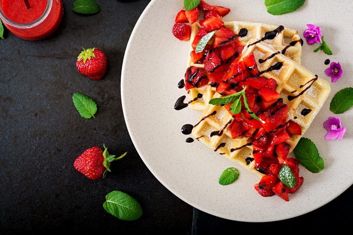 Waffles with Strawberries and Chocolate Drizzle