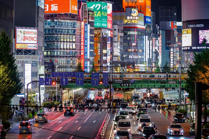 Evening Traffic and Neon Lights in Tokyo Megapolis