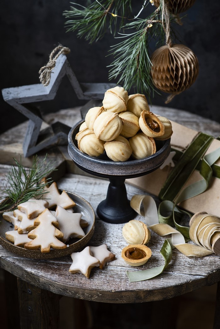 Christmas cookies and decorations on a wooden table