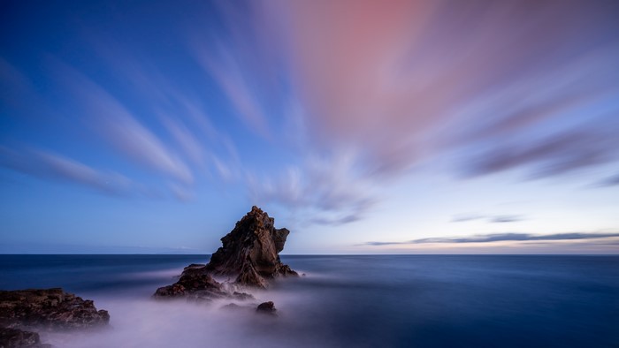 Rock formation in the sea at sunset, Madeira, Portugal