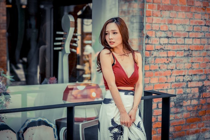 4K Asian Woman with Brown Hair and Skirt
