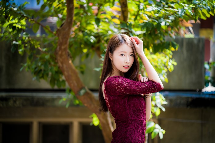 4K Asian Woman in Burgundy Dress with Bokeh