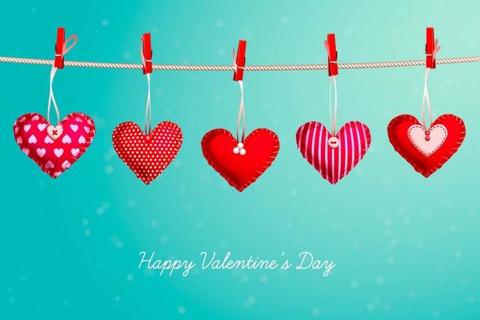 Happy Valentine's Day hearts hanging on a line