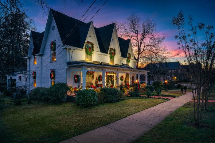 Christmas decorated house in West Point, Georgia at dusk