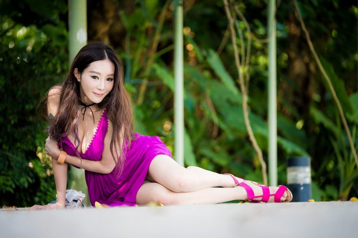 4K Asian Woman Sitting in Purple Dress