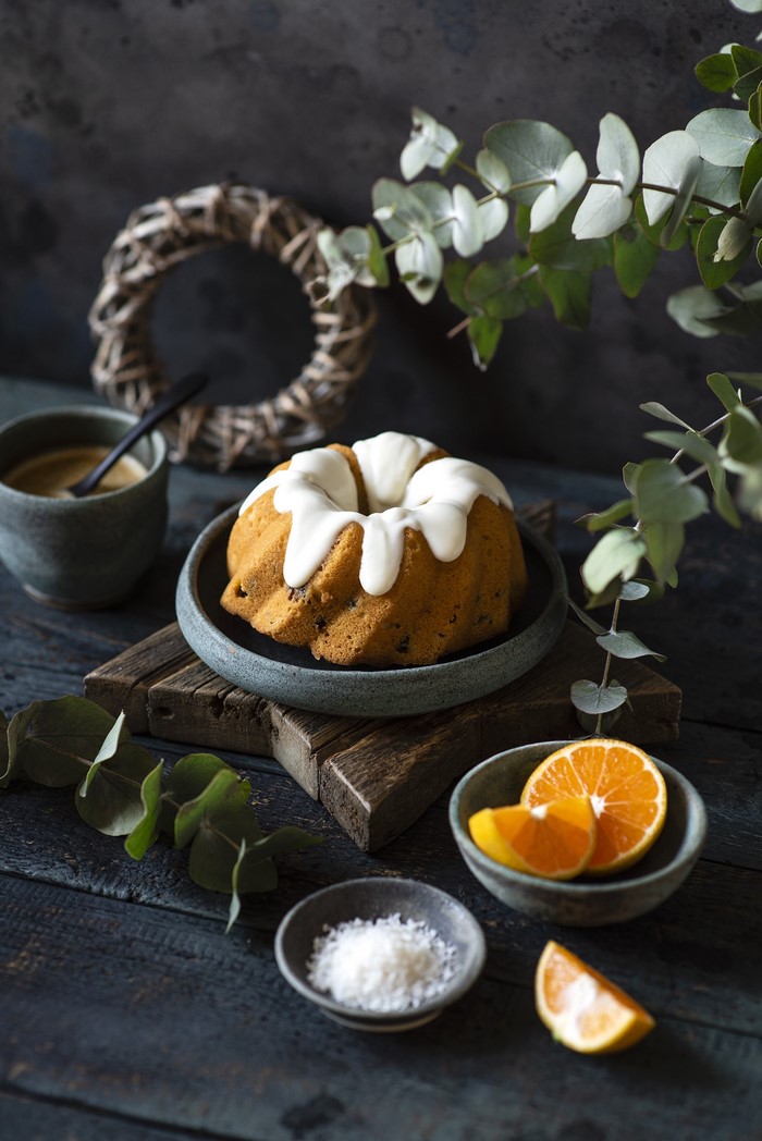 Bundt cake with orange slices and coffee