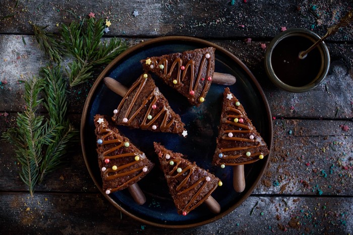 Christmas tree brownies with sprinkles on a plate