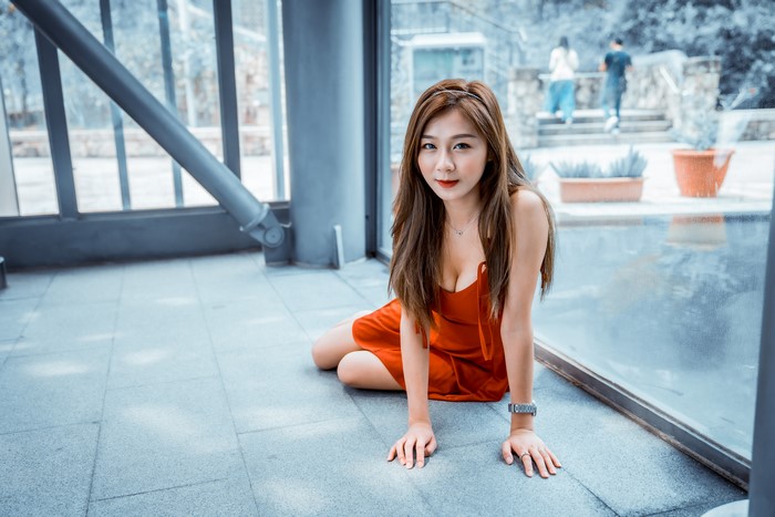 4K Asian Woman Sitting in Red Dress