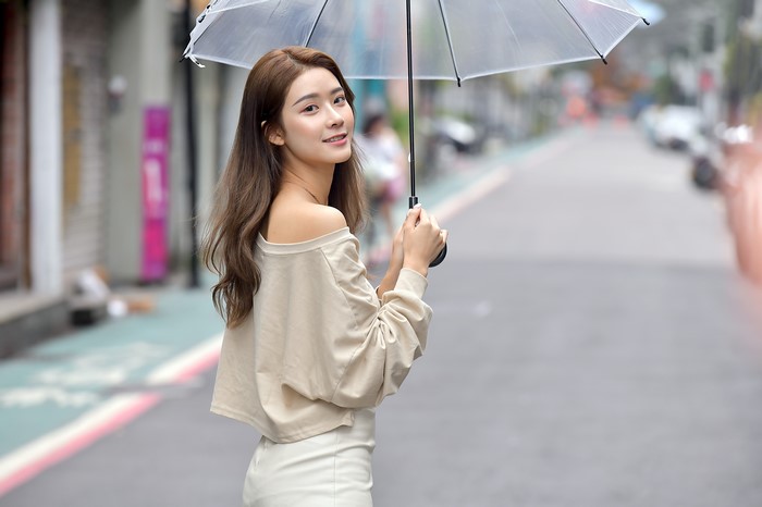 4K Asian Woman with Umbrella on Street