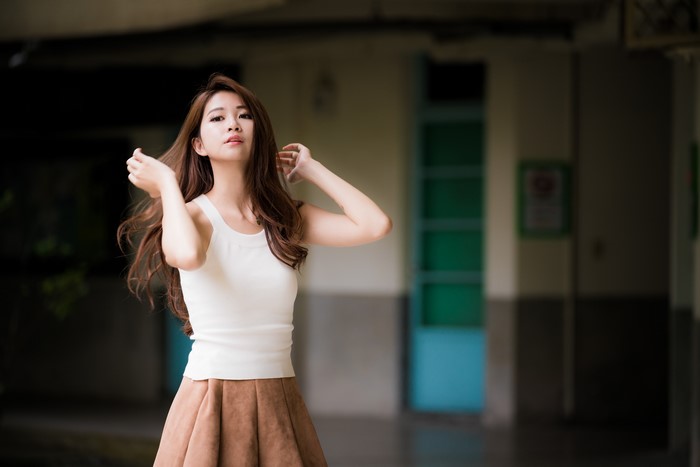 4K Asian Woman in White Singlet and Brown Skirt
