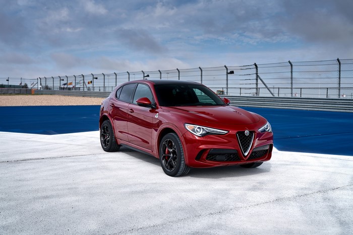 Red Alfa Romeo Stelvio Quadrifoglio on a Racetrack