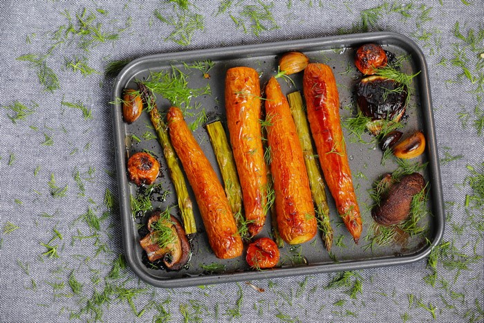 Roasted Carrots, Asparagus, Mushrooms, and Tomatoes on a Baking Sheet