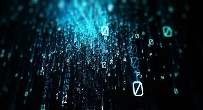 Binary Code Falling Through Darkness