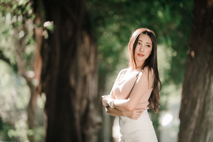 4K Asian Woman with Brown Hair in Nature