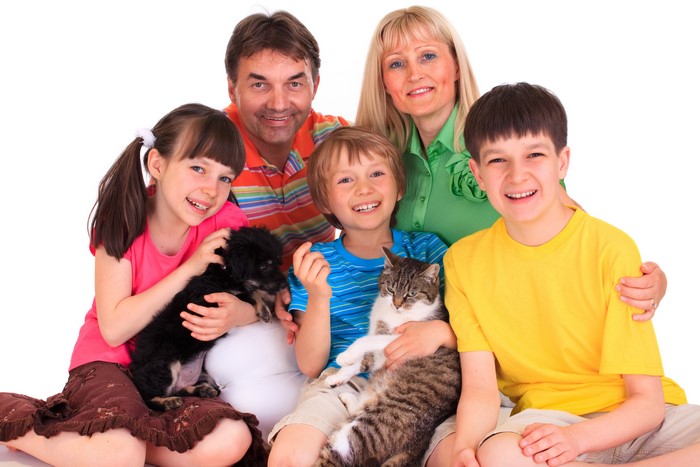 Family with Dog and Cat on White Background