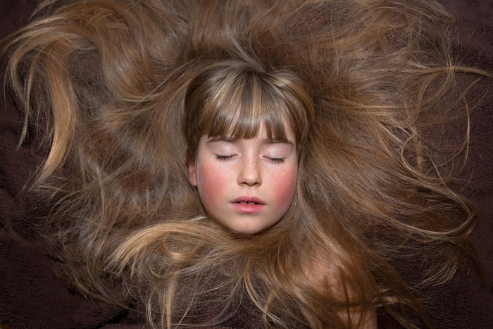 Little girl with long brown hair
