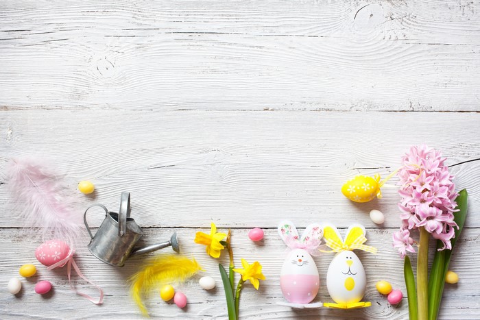 Easter Eggs and Hyacinth Flower on White Wood