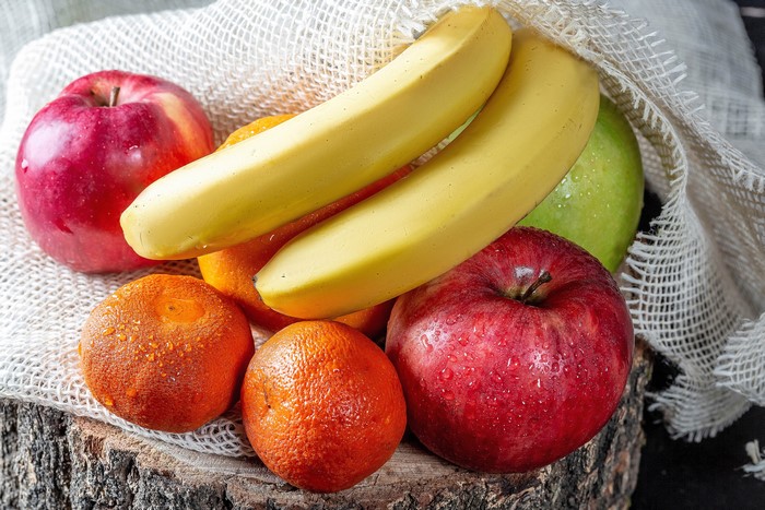 Apples, Bananas, and Mandarins with Water Drops