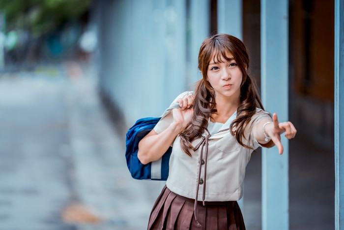 4K Asian Schoolgirl with Brown Hair in Bokeh