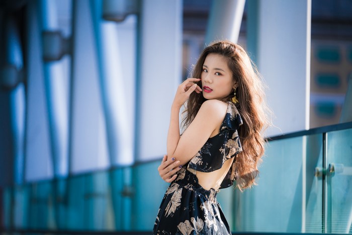 Woman in floral dress with brown hair