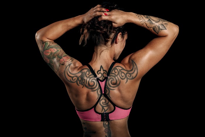 4K Back View of Tattooed Woman