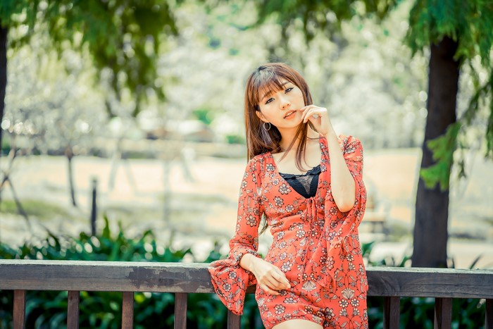 4K Asian Woman with Brown Hair and Bokeh