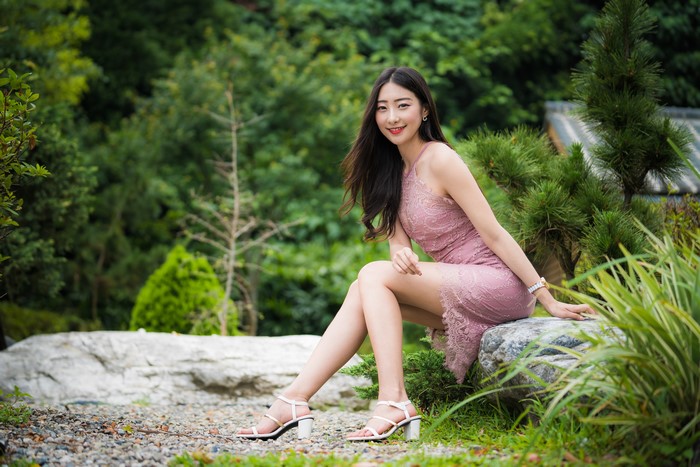 4K Asian Woman Sitting in Pink Dress