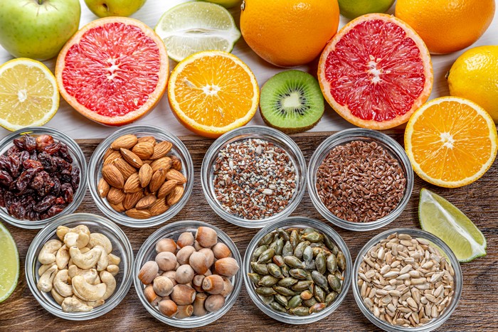 Assortment of Nuts, Seeds, and Citrus Fruits