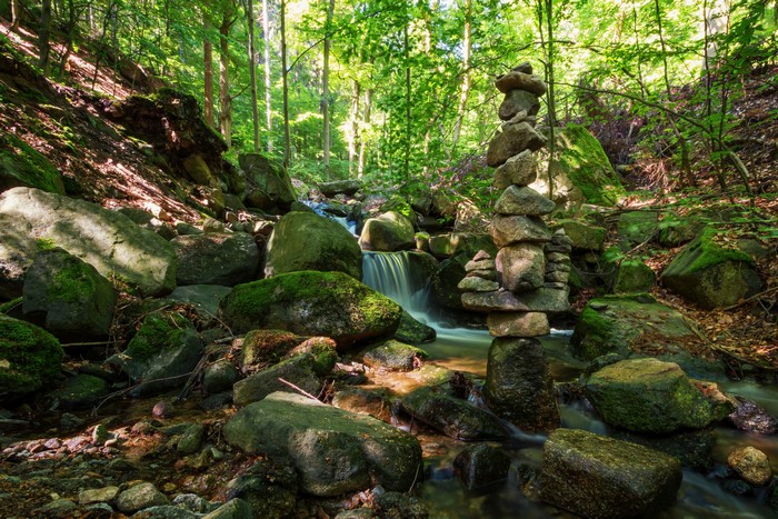 Stone cairn by a stream in Stecklenberg, Germany