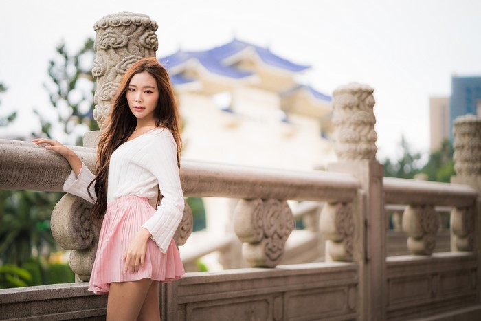 4K Asian Woman with Pink Skirt in Bokeh