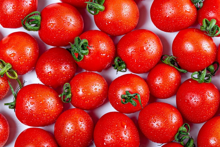 4K Tomatoes with Water Drops Closeup
