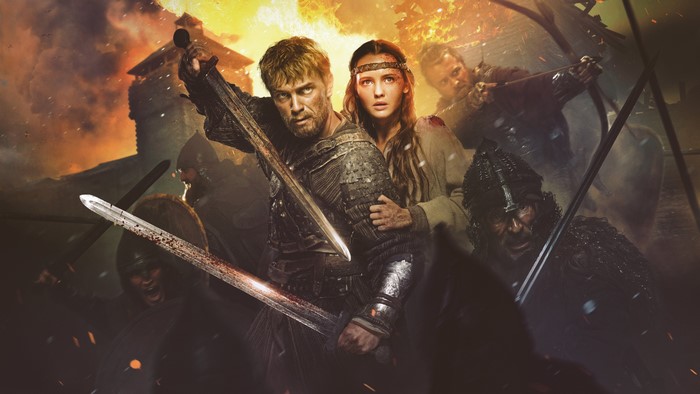 Warriors in battle with swords and fire