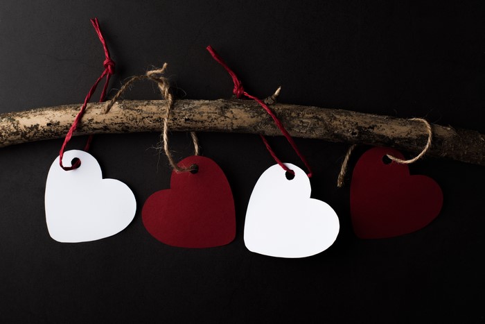 Heart-shaped tags hanging from a branch