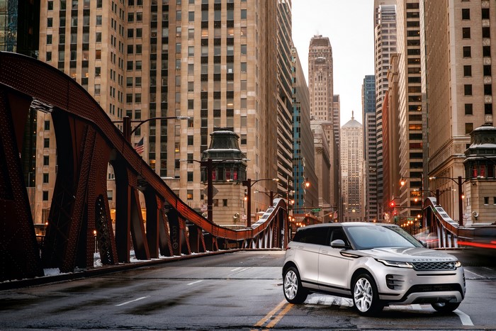 Silver Land Rover Evoque on Chicago Bridge
