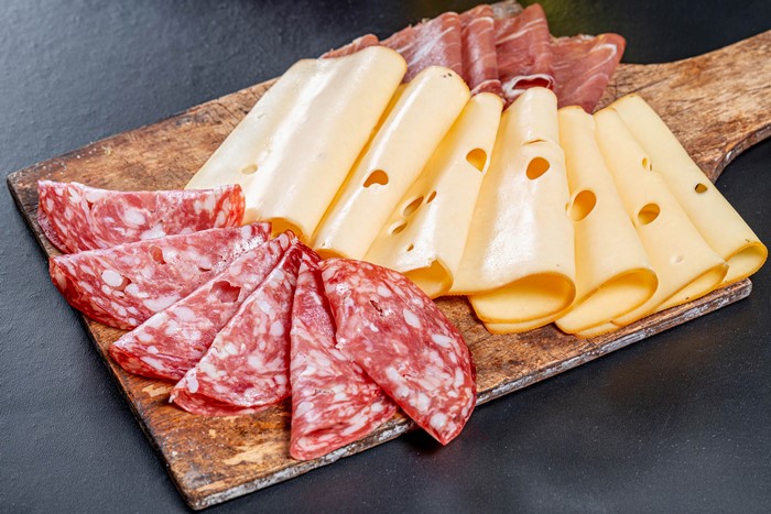 Sausage, Cheese, and Ham Platter on Cutting Board