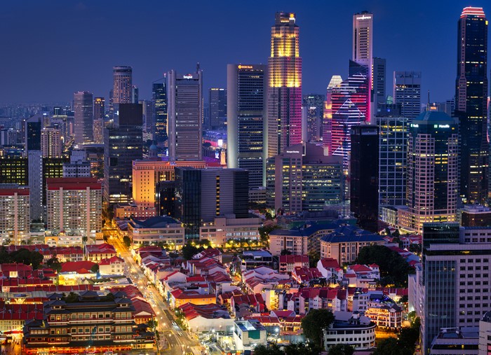 Singapore Skyline at Dusk with Traditional Houses