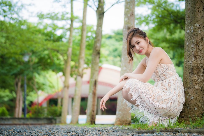 4K Asian Woman Sitting Pose in Dress