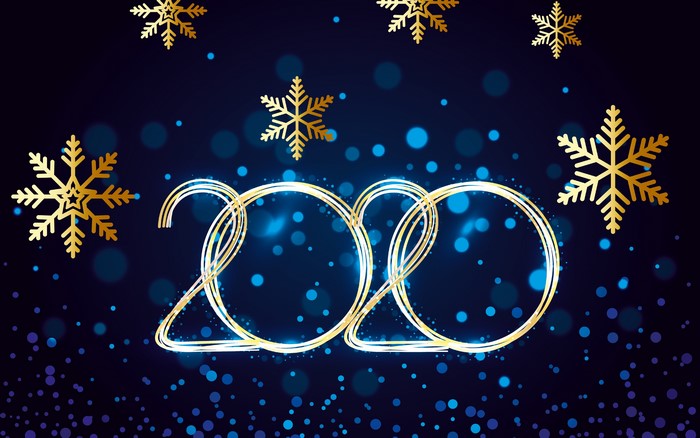 Golden 2020 text with snowflakes and bokeh