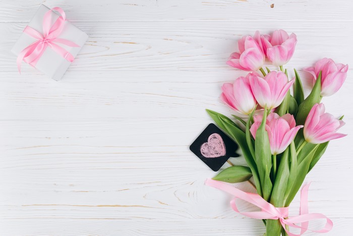 Pink Tulips and Gift Box on White Wood