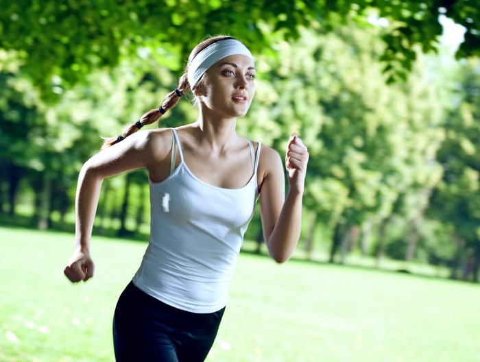 Woman running in a park