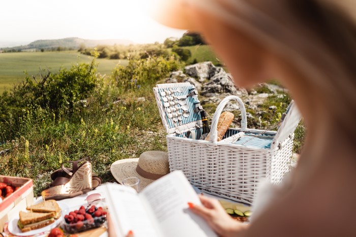 Picnic with a wicker basket and food