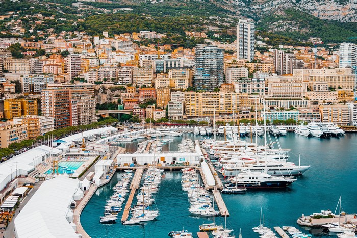 4K Monaco Marina with Yachts and Monte Carlo Cityscape