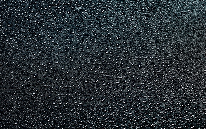 Black background with water drops texture