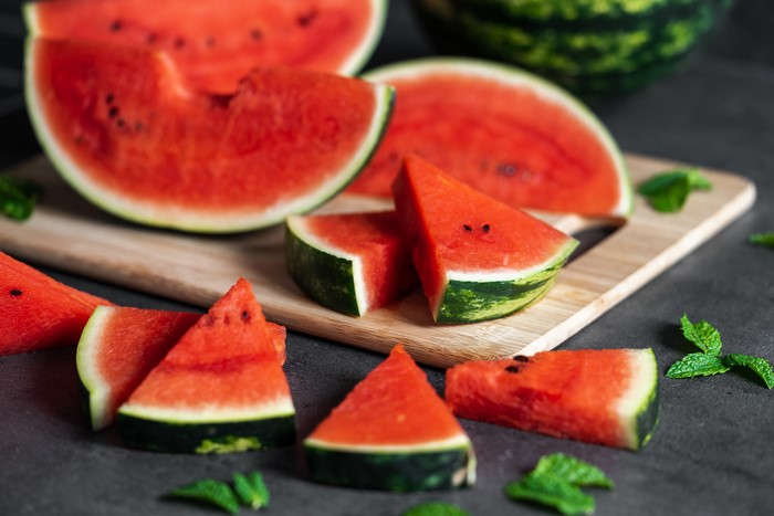 Watermelon slices on a cutting board