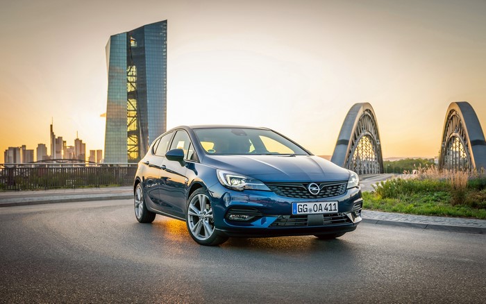 Blue Opel Astra parked near European Central Bank building
