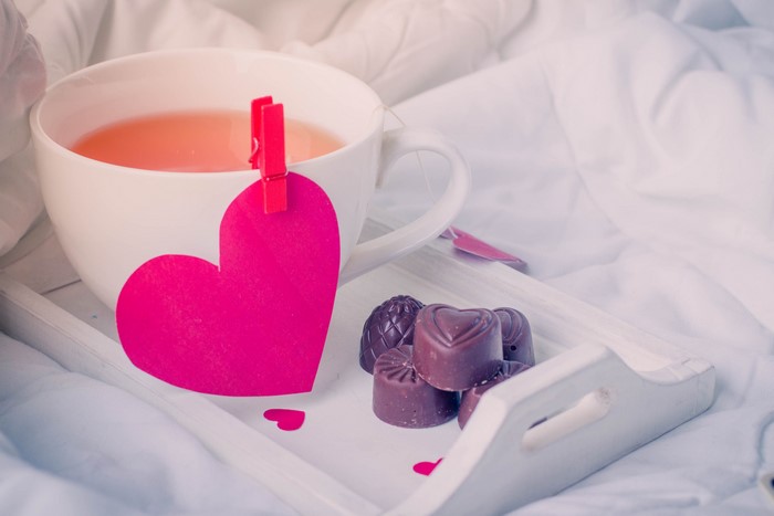 Valentine's Day tea with chocolates on a tray